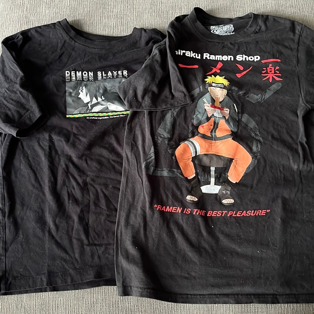 2 black anime style shirts